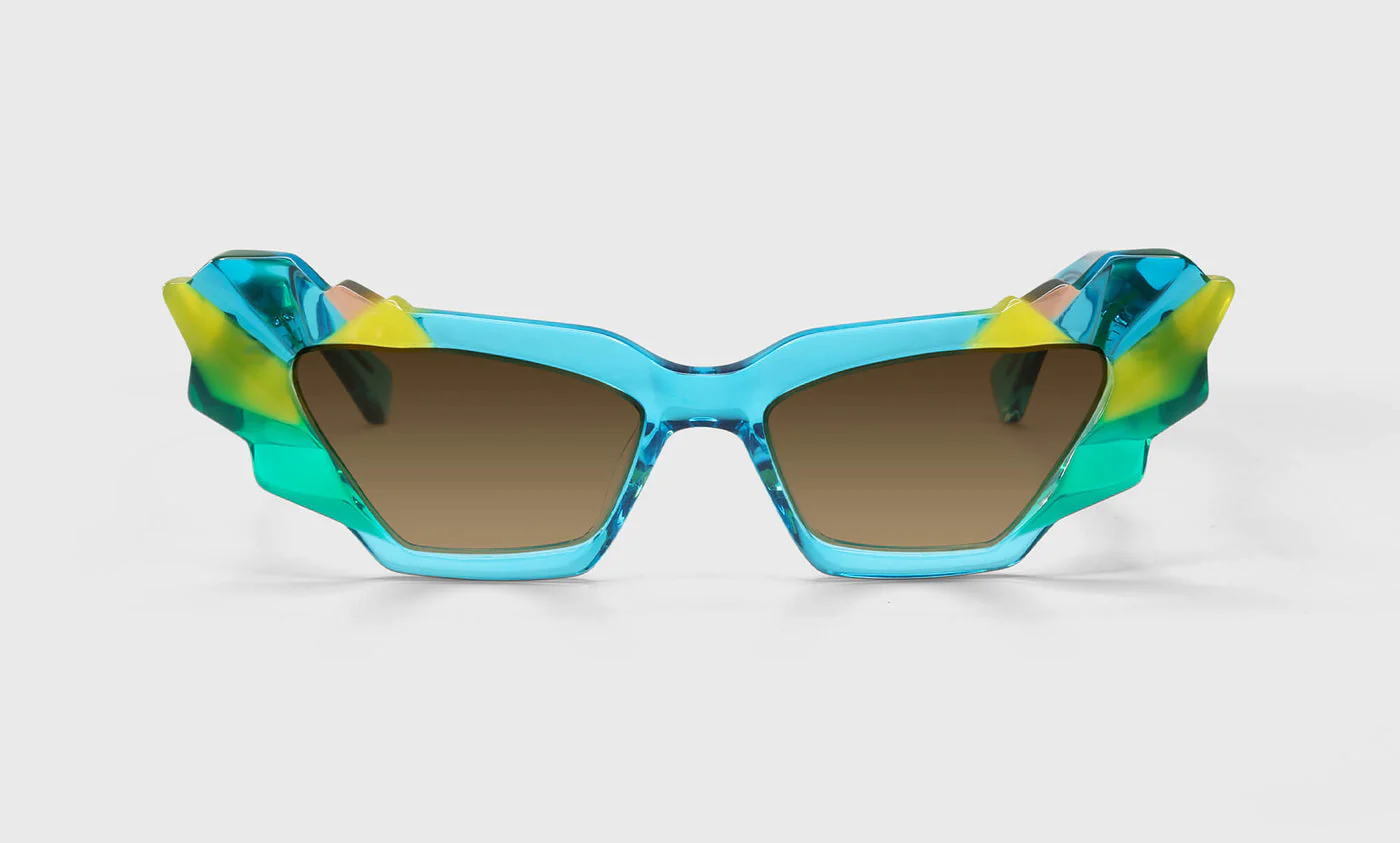 Eye of the Beholder Color 10 - Bursts of Teal, Yellow, and Green Trapezoids with Hits of Orange on the Temples